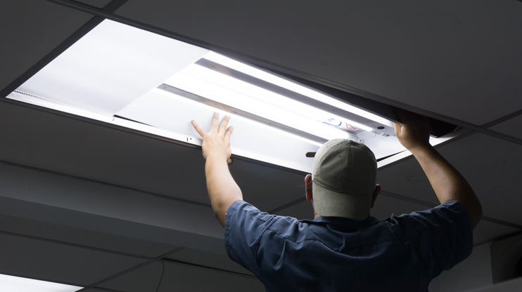 Man installing LED Lighting